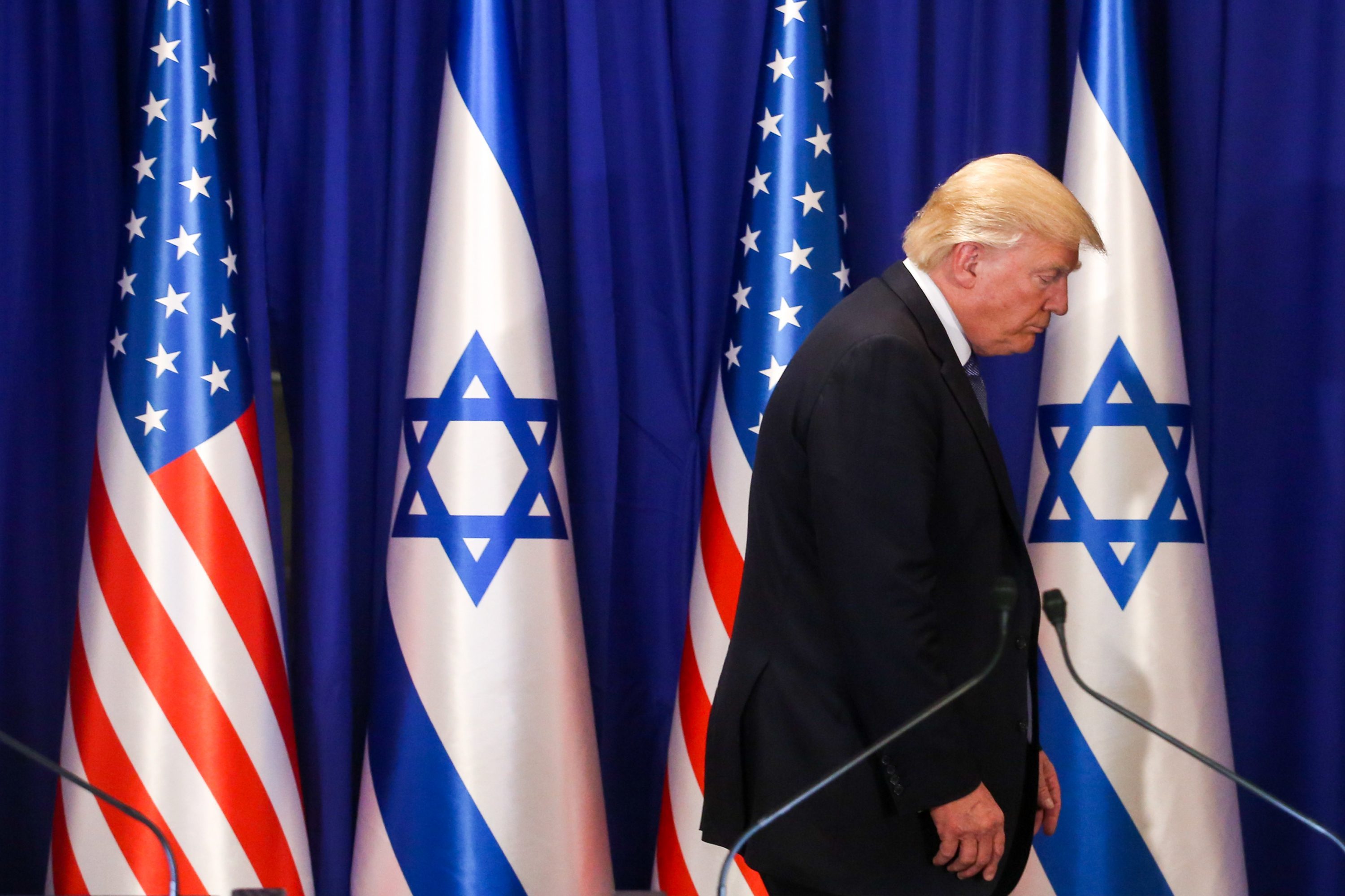 גם אם זה לא נאמר, מבחינתו ברור שמתבססים על פתרון שתי המדינות. טראמפ בישראל צילום: Marc Israel Sellem/POOL